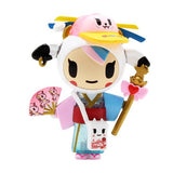 A figure in a kimono is holding a fan from a Kawaii All Stars Blind Box by tokidoki.