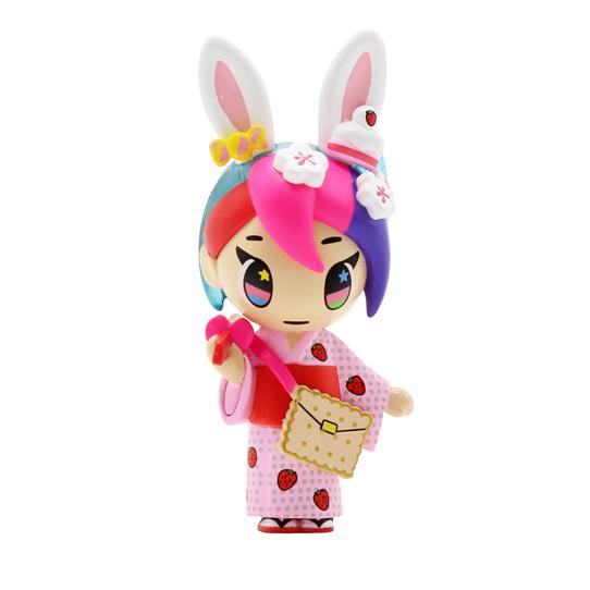 A Kawaii All Stars Blind Box by tokidoki toy bunny dressed in a japanese outfit holding a bag.