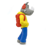 A Rumpus figurine of a rhino wearing a backpack created by UVD Toys.