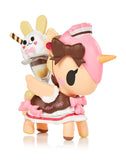 A collector's figurine of a tokidoki Unicorno Series 11 Blind Box adorned with ice cream and accompanied by a bunny.