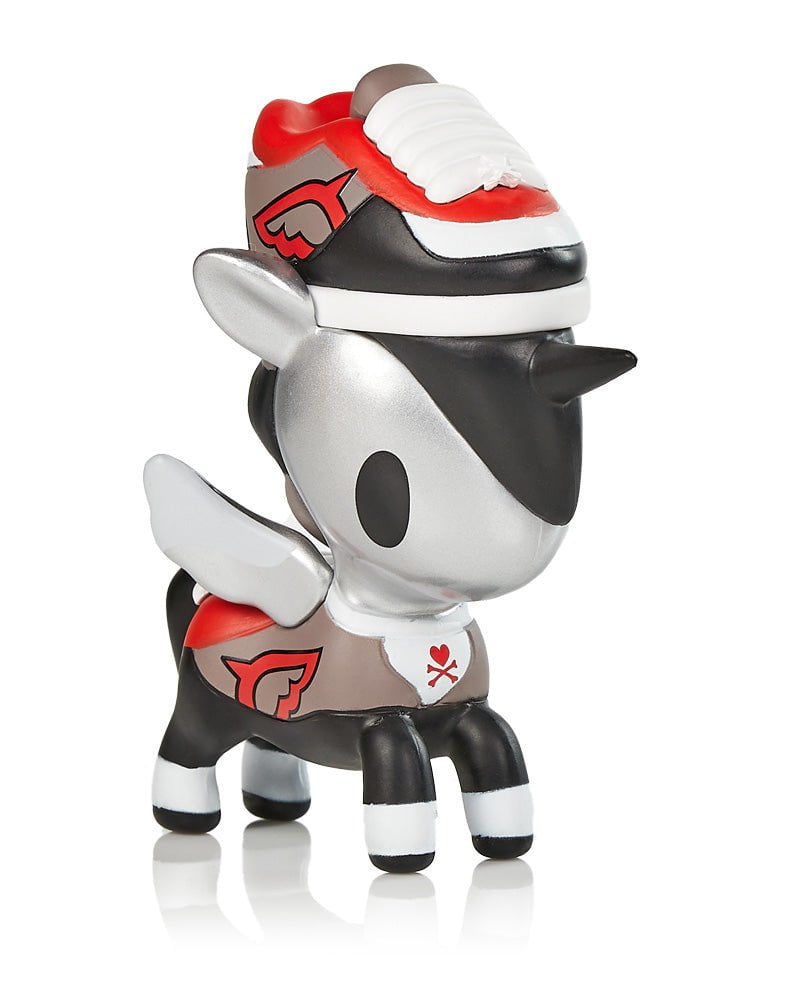 A small toy from the Unicorno Series 11 Blind Box by tokidoki with a pair of shoes on it.