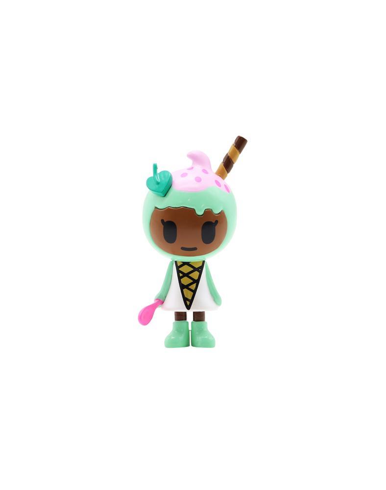 A figure of a girl holding a tokidoki Ice Cream Girls 3-Pack, inspired by summer vibes.