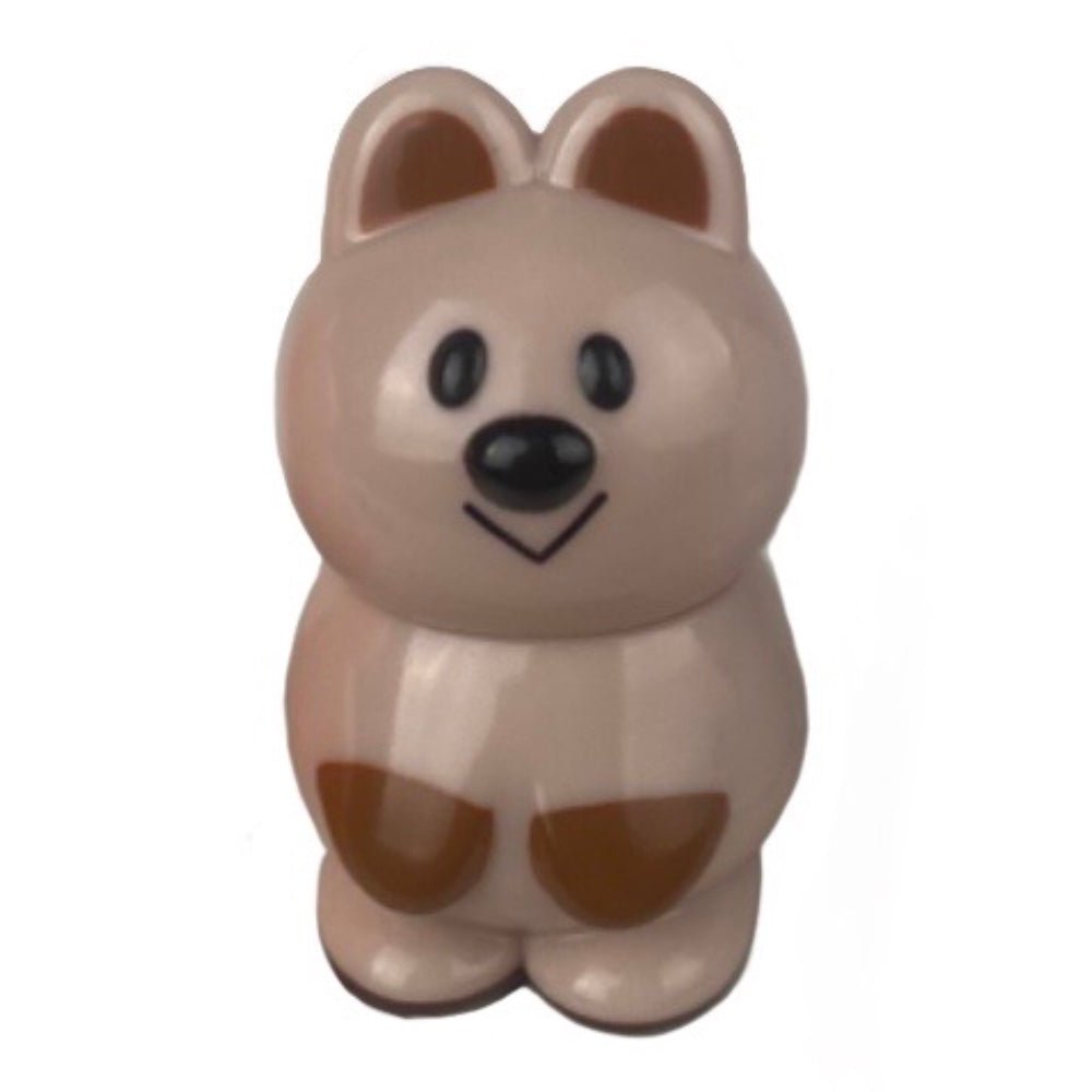 A small bear shaped salt shaker on a white background, reminiscent of VAG 33 - Kuokka Chan figures by Medicom (JP).