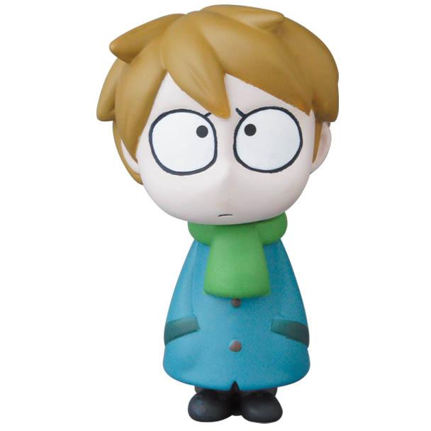 The VAG Series 25 β Edward the Timid Friend by SONIC, crafted by Medicom (JP), showcases the charm typically found in Japanese vinyl toy artistry with its cartoon character featuring large eyes and a serious expression, complete with a blue coat and green scarf. This design makes it a standout addition to any gachapon figures collection.