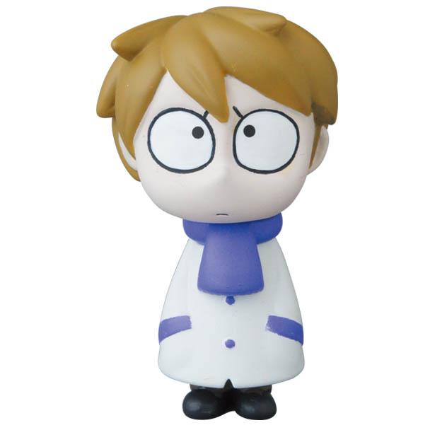 Inspired by Japanese vinyl toy creators, Edward the Timid Friend from Medicom's VAG Series 25 stands with a perplexed expression. This cartoon-style figure features brown hair and is dressed in a white coat with blue buttons and a blue scarf, capturing the charm of collectible gachapon figures.