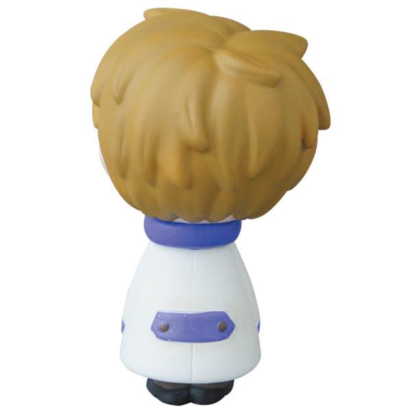 This charming rear view portrays the VAG Series 25 β Edward the Timid Friend by SONIC, showcasing brown hair beneath a white coat with purple accents. Created by Medicom (JP), it beautifully captures the whimsical essence often found in gachapon figures, reminiscent of Japanese vinyl toy artistry.