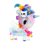 A kawaii toy unicorn with a hat on its head from the Kawaii All Stars Blind Box by tokidoki.