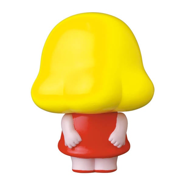 A yellow doll with a red dress on a white background designed by Japanese vinyl toy artists from the VAG Series 28 — A.girl by Seri★Norica, created by Medicom (JP).