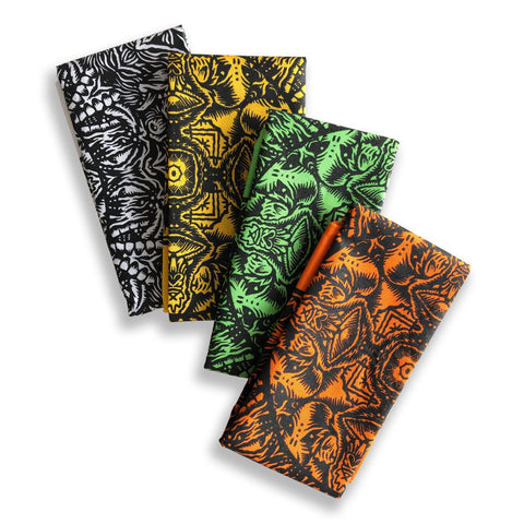 Four Cherry Moth Cake Bandanas with different designs on them.