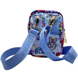 A blue cross body bag from the tokidoki Naughty or Nice Convertible Belt Bag Collection with a convertible strap.