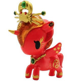 A red toy unicorn with a crown on its head is the tokidoki Zodiac Unicorno — Cancer.