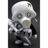A close-up of a Playge (HK/US) Squadt GERM s006 figurine resembling a cartoonish character in a white mask, with a