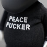 Close-up of a Playge (HK/US) Squadt GERM s006 black shirt with the provocative phrase 