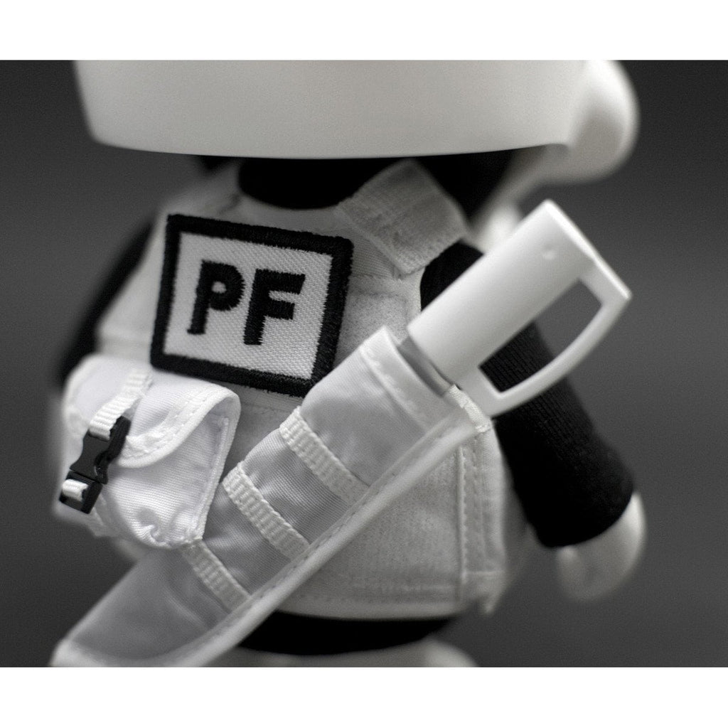 Close-up of a Playge (HK/US) Squadt GERM S006 [PEACE F***ER] figurine wearing a white astronaut suit with a 