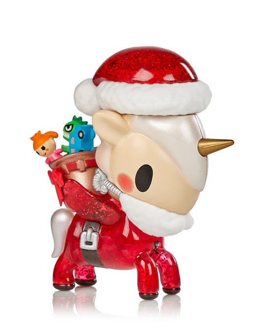 A Holiday Unicorno Limited Edition Jolly figurine with a Santa hat, perfect for the Christmas season by tokidoki.