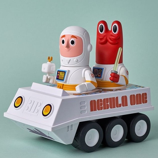 A vintage Joy Riders Nebula One Deluxe Set toy car with two astronauts, ready for space adventures by LK Toys (US).
