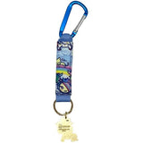 A blue carabiner with a Naughty or Nice Star Fairy Key Clip from the tokidoki Bag Collection attached to it.