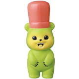A Japanese vinyl toy of a green teddy bear with a red hat called VAG Series 28 — Koguma Kekiyasan by Kamentotsu by Medicom (JP).