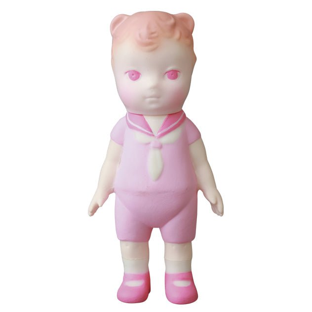 A pink doll with a pink bow on her head, inspired by Japanese vinyl toy artists, VAG 30 β Kumamimichan by Medicom (JP).