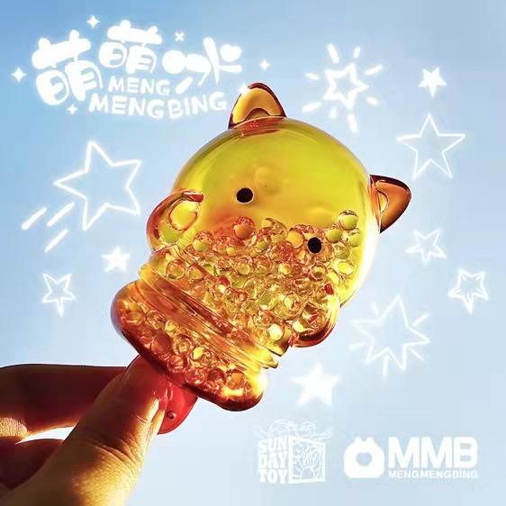 A person is holding a yellow cat with stars in the background, reminiscent of Meng Meng Bing Dog Popsicle Mini-Figure by Sun Day Toy (CN).