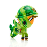 A green toy from the tokidoki Mermicorno Series 7 Blind Box with a camouflage hat on it.