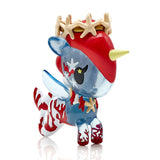 A small figurine of a unicorn with a crown on its head from the Tokidoki Mermicorno Series 7 Blind Box collection.