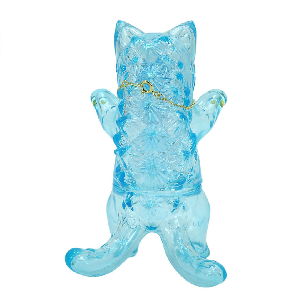 A Japanese glass figurine of a Negora Birthstone Collection — Aquamarine cat standing on its hind legs by Konatsuya (JP).