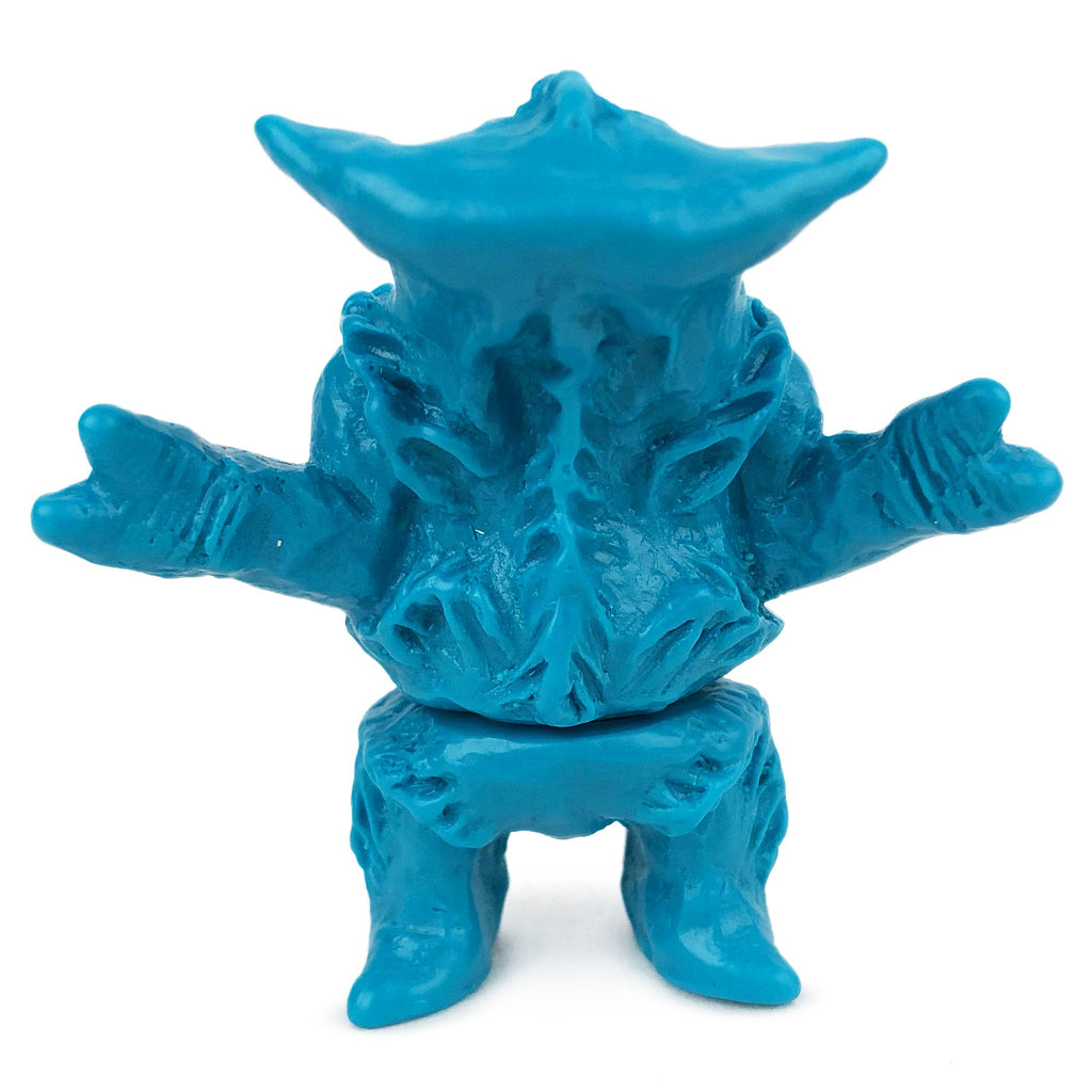 A blue Neo-Fighters X Rotofugi 312 Edition toy figure from Geoff Maxfield stands on a white background.