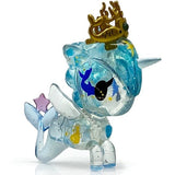 A small figurine of a tokidoki Pisces Zodiac Unicorno, wearing a crown.