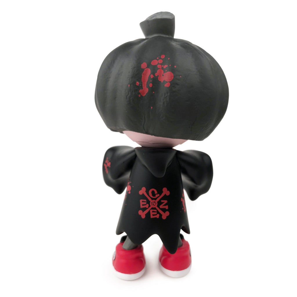 A limited edition PumpKid — Collect or Die Edition figurine with blood on it, perfect for Halloween by Clutter Studios (US).