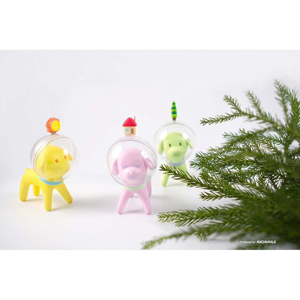 A small group of Puppy Tang — Little Forest Pre-Order plastic ornaments with a tree in the background by AICHIAILE (CN).