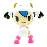 A sports All Star Champs Blind Box by tokidoki toy cow is holding a ball.