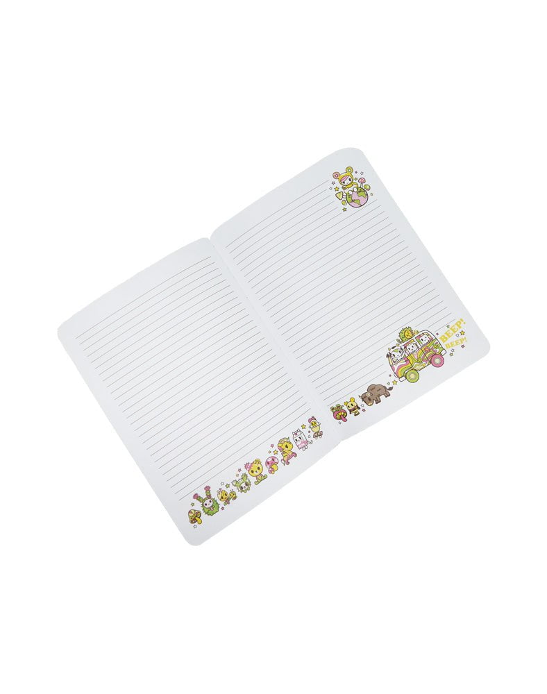 A white Stay Wild Notebook with a classic character on it by tokidoki.