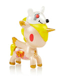 A tokidoki Unicorno — Lunar Calendar Metallico Blind Box toy with a hat on its head.