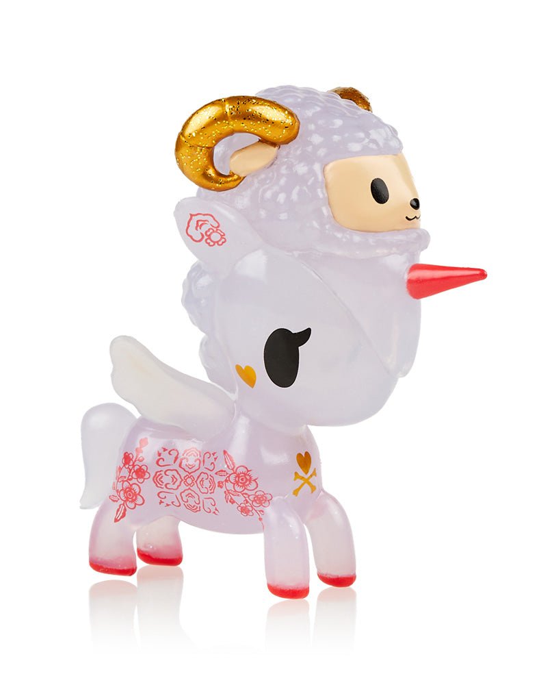 A tokidoki Unicorno — Lunar Calendar Metallico Blind Box toy with golden horns.