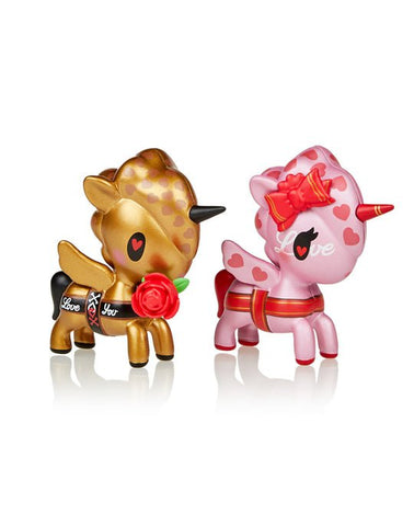 Two adorable Tokidoki Sweet Heart Unicornos with roses on their heads, perfect for Valentine's Day.