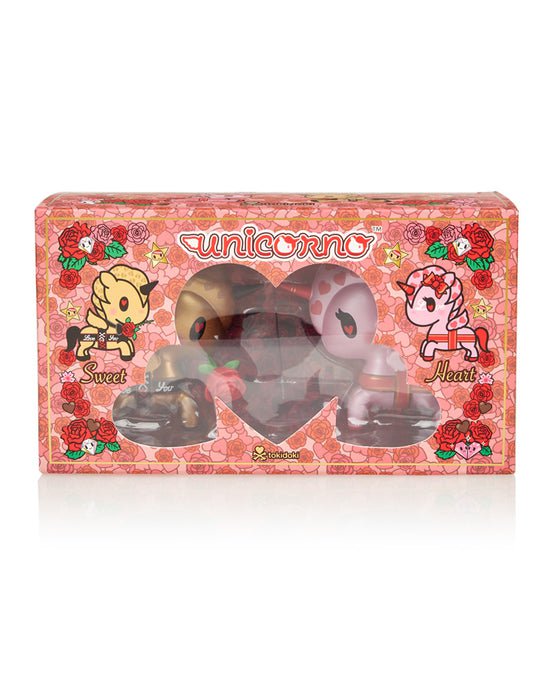 A box containing a pink Tokidoki Sweet Heart Unicorno 2-Pack figure with a pink cat.