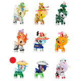 A group of Unicorno After Dark Series 3 Blind Box toys with different hats on them from the tokidoki brand.