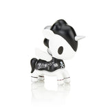 A black and white tokidoki x MLB Chicago White Sox Unicorno 2022 toy on a white surface, representing Chicago pride.