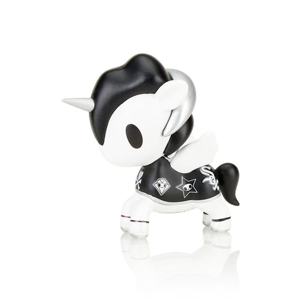 A black and white tokidoki x MLB Chicago White Sox Unicorno 2022 toy on a white surface, representing Chicago pride.