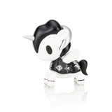 A black and white tokidoki x MLB Chicago White Sox Unicorno 2022 toy on a white surface, representing Chicago pride.
