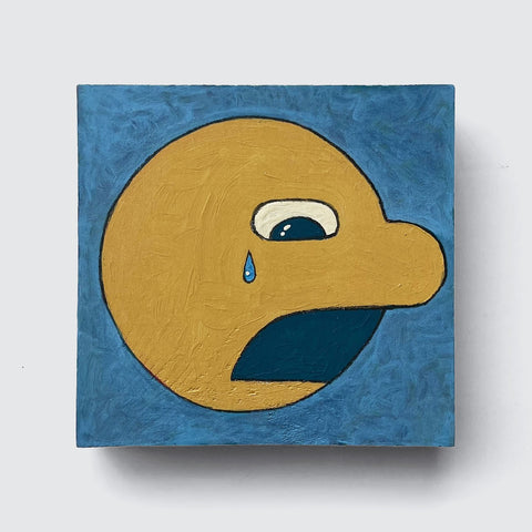 The product *Carl Variation 5* by Shawn Smith, available from Rotofugi (EX122024-29), depicts a painting of a yellow circle with exaggerated facial features set against a blue background, featuring a face with a large open mouth and a single tear beside the eye.