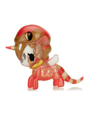 The Tokidoki Year of the Snake - Charmer Unicorno, a small, colorful figure resembling a unicorn, features dual snake designs on its back and wings in vibrant red and gold hues with heart details, symbolizing transformation for the Year of the Snake.