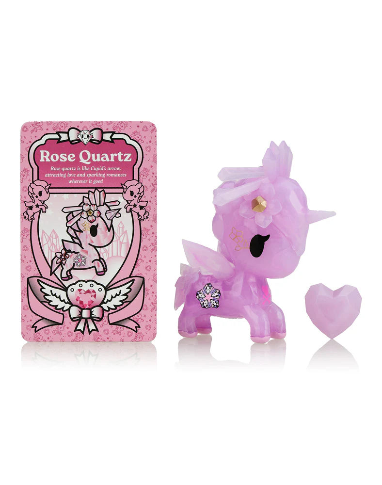 The Tokidoki Precious Unicorno Blind Box includes a figurine with a heart-shaped object and a 