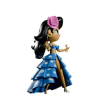 Chikitas! — Rumberita by Kaleidos Creative features a stylized female figure in a blue polka dot ruffled dress, gold jewelry, high heels, and a pink flower in her hair, striking a spirited pose with hands raised.