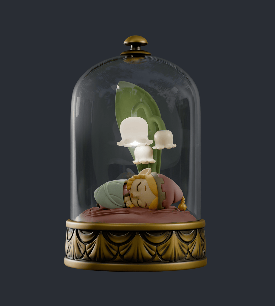 The Cloche Fairies Blind Box by Kaleidos Creative features a figurine of a person sleeping under white bell-shaped flowers, enclosed in a glass dome with a decorative gold base.