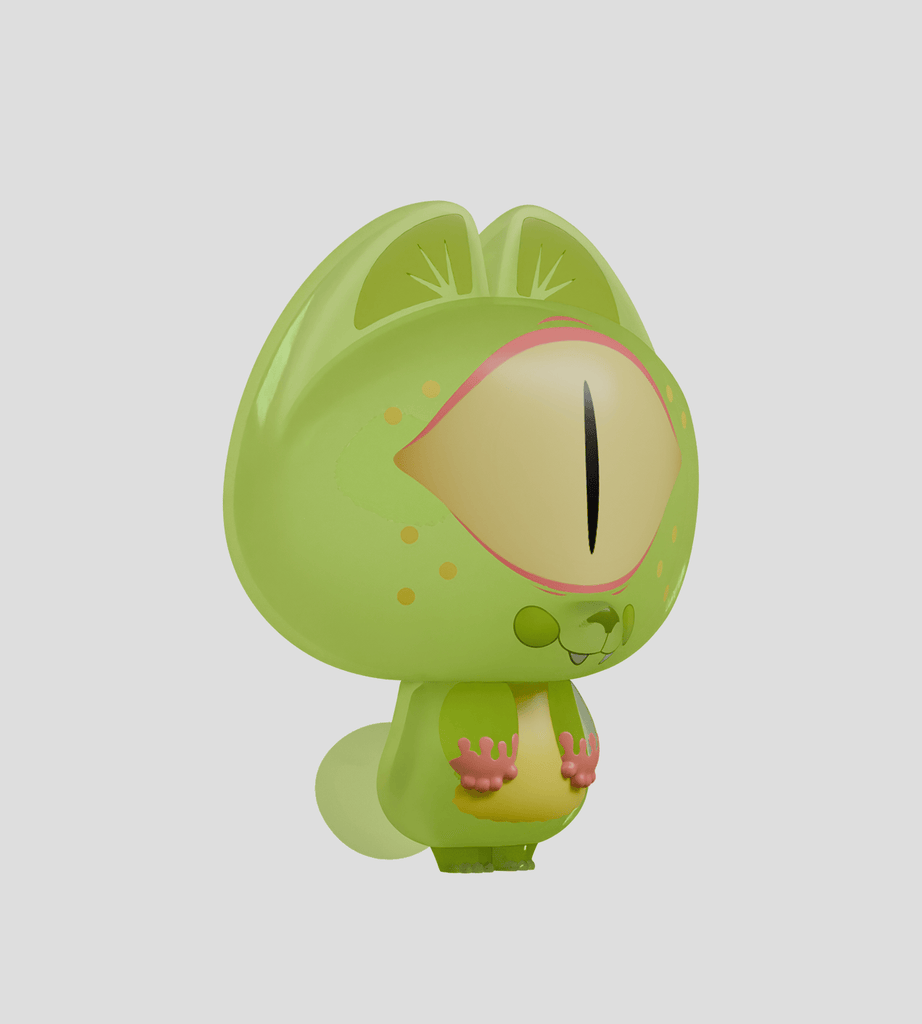 A green cartoon chameleon figure with a large single eye from Kaleidos Creative’s Creative Dump Blind Box stands upright, facing slightly to the side against a plain background.