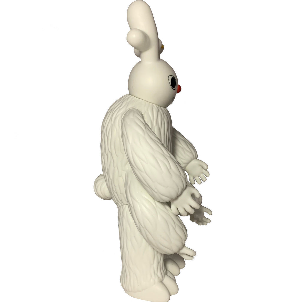 Side view of Dream Monster - OG (White) by The Little Hut (HK): a white, cartoonish figure with textured fur, red nose, round eyes, and long limbs—an ideal whimsical decor piece for your shelf.