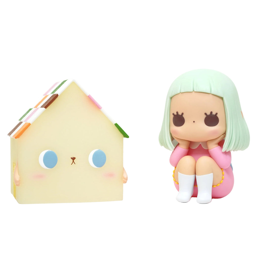 Daydreamer — A Colorful House by How2Work features a pastel figurine of a mint-haired girl beside a cat-faced house—an ideal pick for daydreamers and décor lovers.