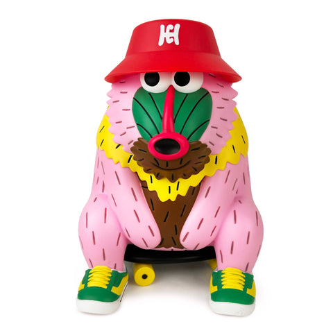 The Hey Hey — Pink figurine by How2Work (HK) features a cartoonish bear with pink fur, green facial features, a red hat, yellow-trimmed clothes, and green sneakers, sitting on a skateboard.